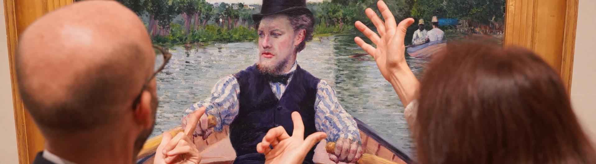 Des visiteurs devant "Partie de bateau"